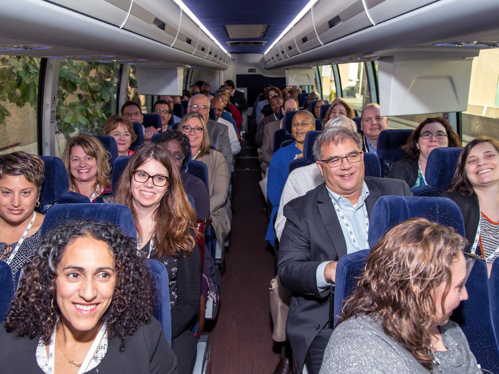 Attendees of the LISC Leadership Conference on a bus tour in Houston
