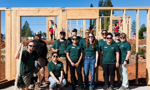 Staff from Community Housing Improvement Program, a LISC partner in northern California, on the site of homes being built through its self-help program.